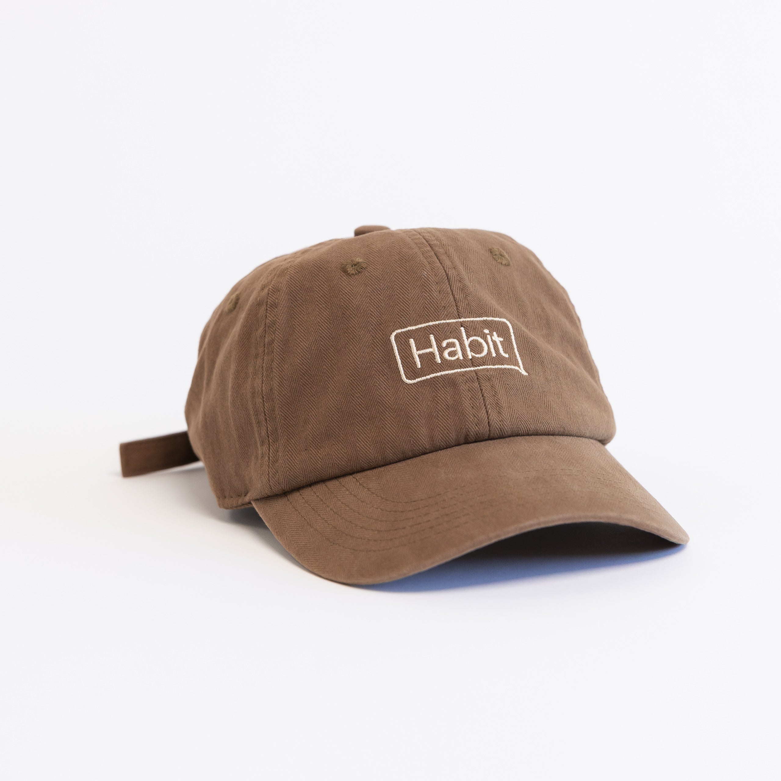 brown baseball cap with Habit logo, brown hat, good habit